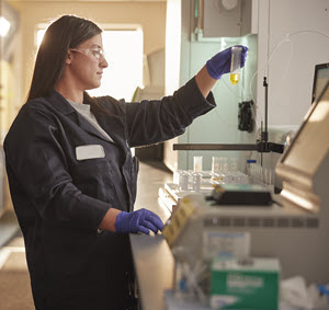 Chevron female employee in lab