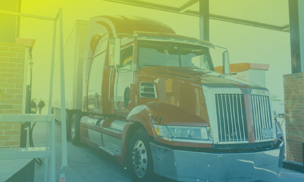 Front of semi truck with green gradient overlay.